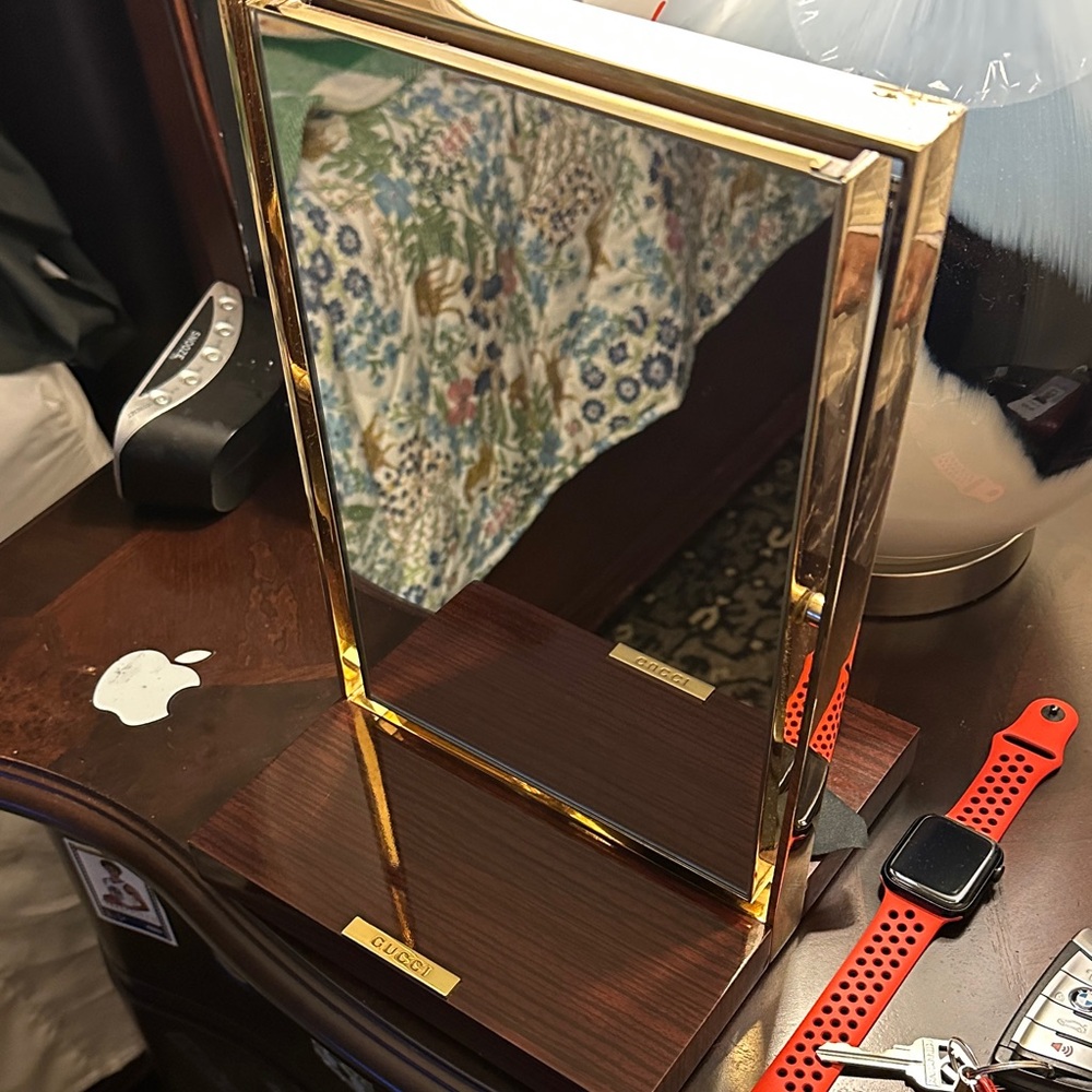 Gucci mirror can't be bought. Gucci uses these in their stores as a display.